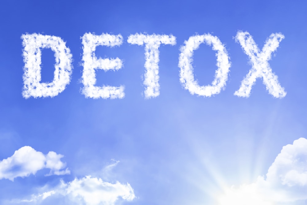 Sober Living as Depicted by a Blue Sky with the Word Detox Written in the Clouds